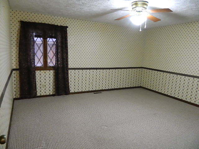 4788 Seven Hills Road Clinton, IL 61727 - Photo 38 of 46 a view of a hallway with a window