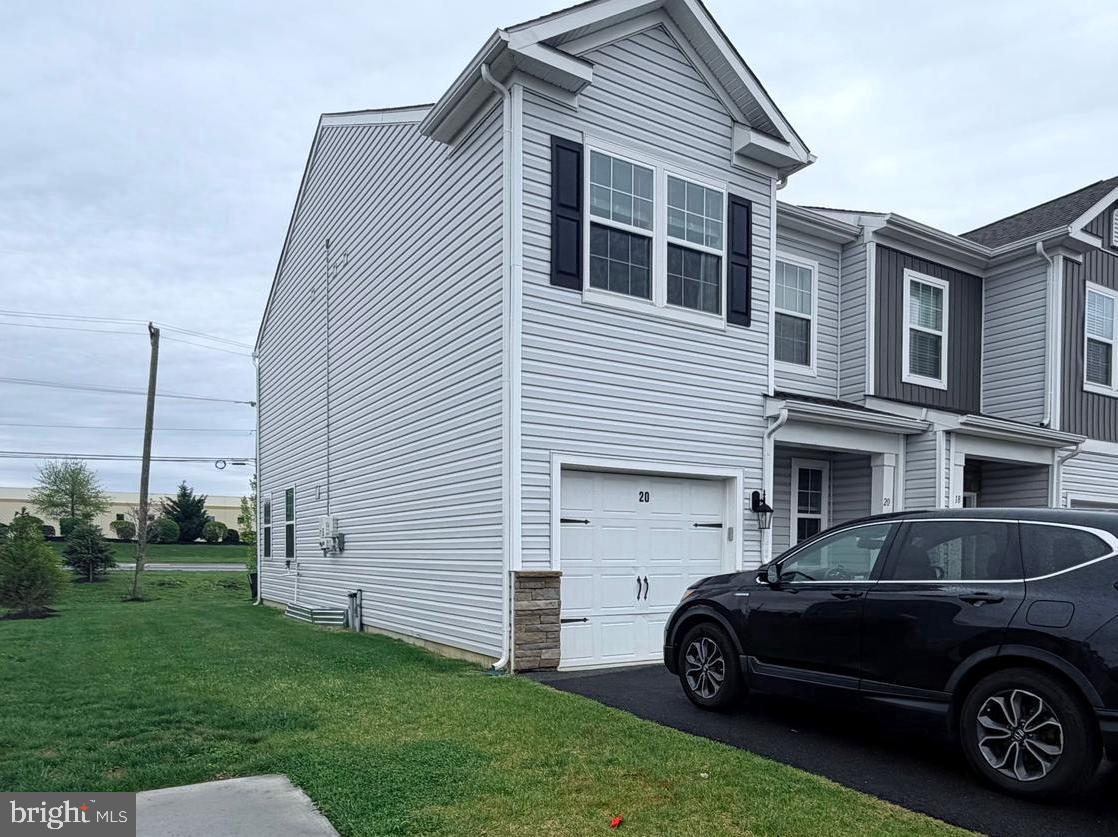 a car parked in front of a house