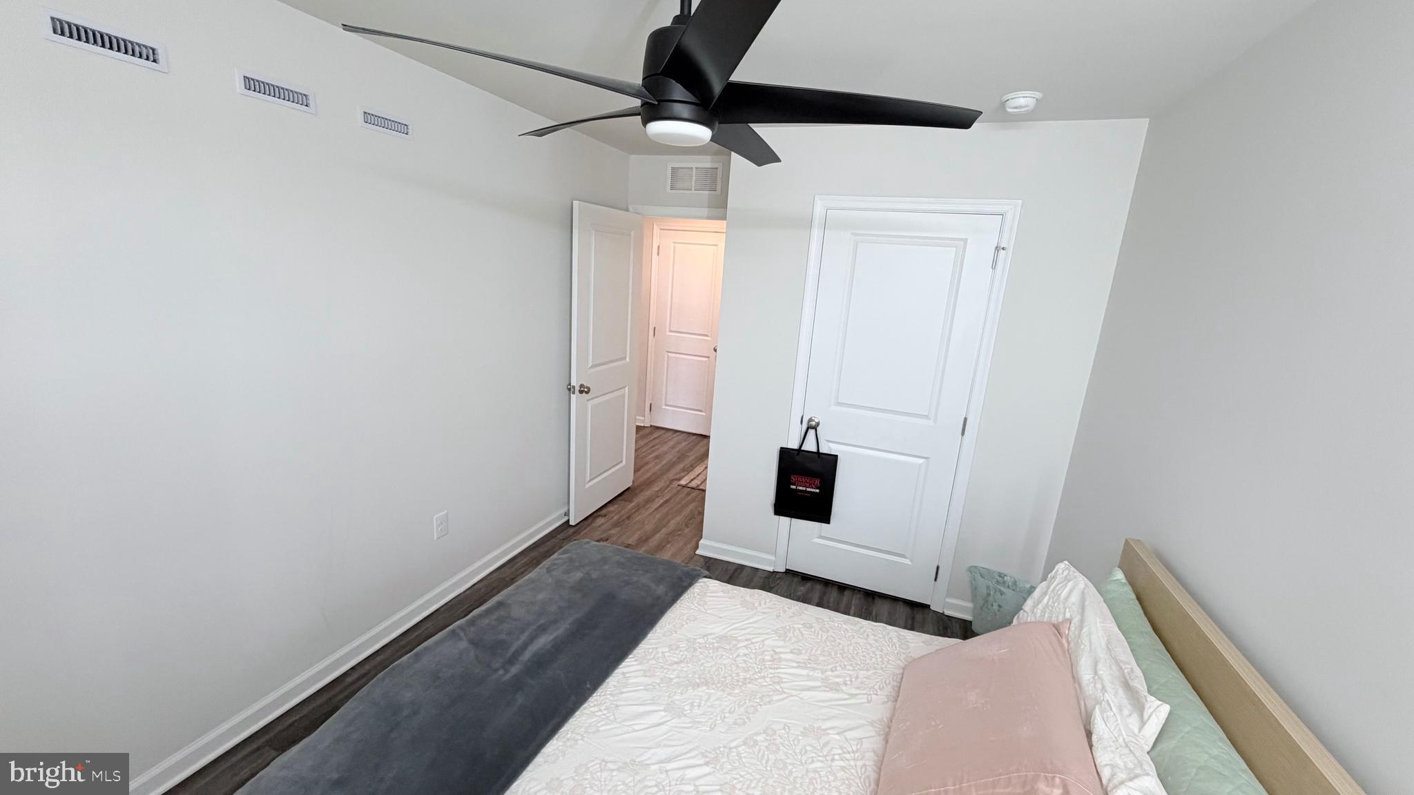 20 Nelsons Way Westampton, NJ 08060 - Photo 11 of 23 a view of a bedroom with a bed and a ceiling fan