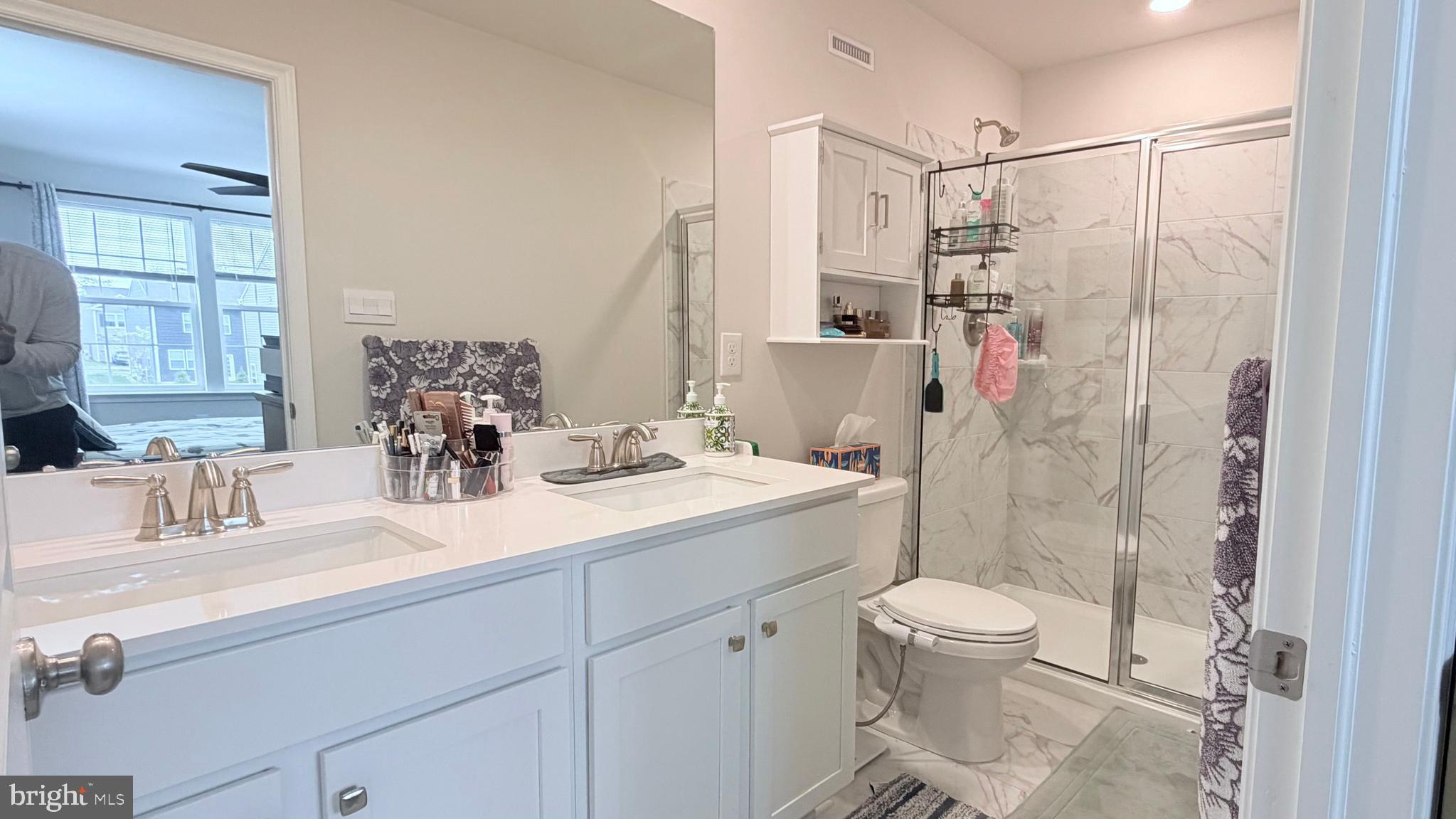 20 Nelsons Way Westampton, NJ 08060 - Photo 18 of 23 a bathroom with a sink toilet and shower