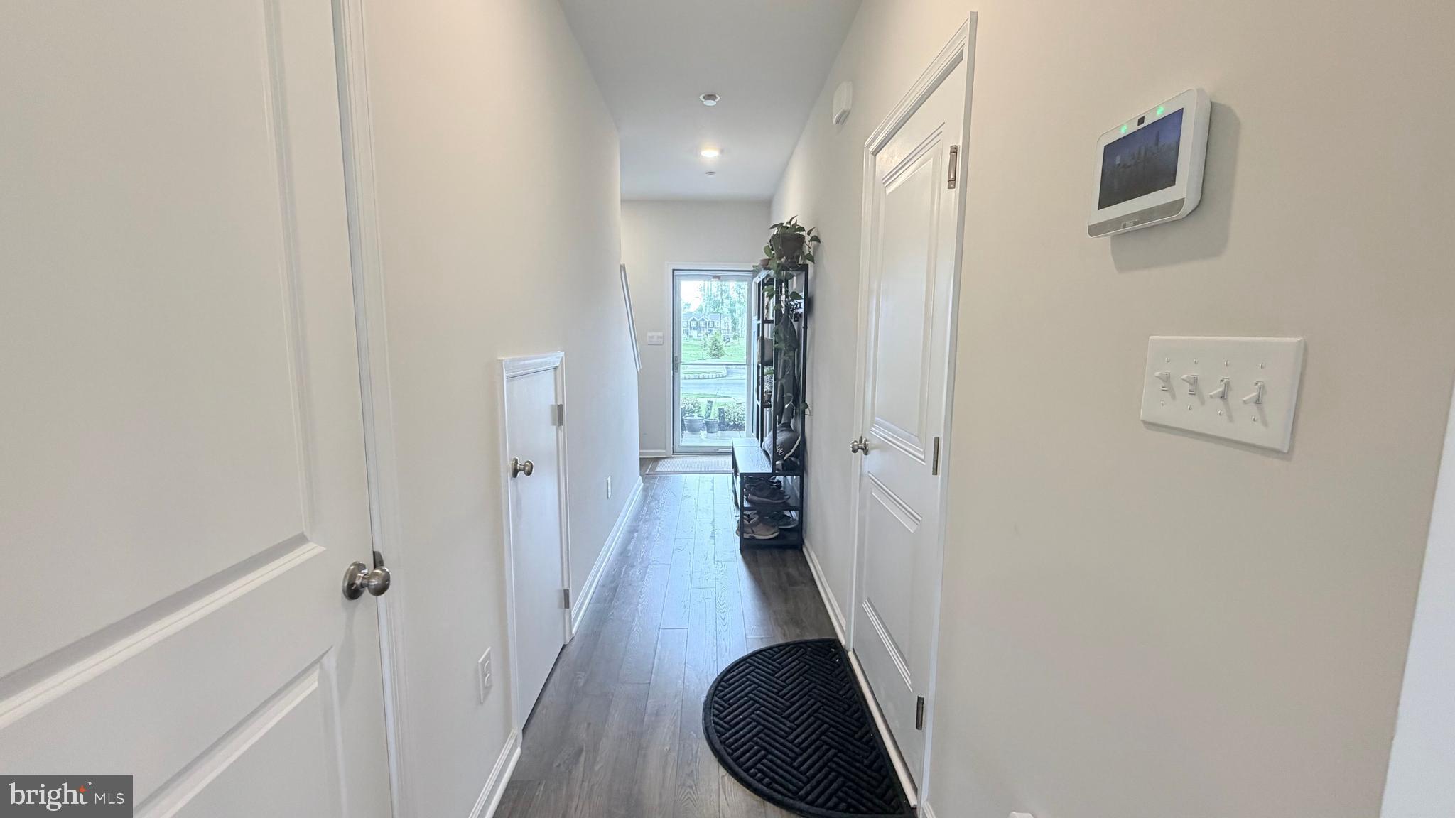20 Nelsons Way Westampton, NJ 08060 - Photo 4 of 23 a view of a hallway with wooden floor and staircase