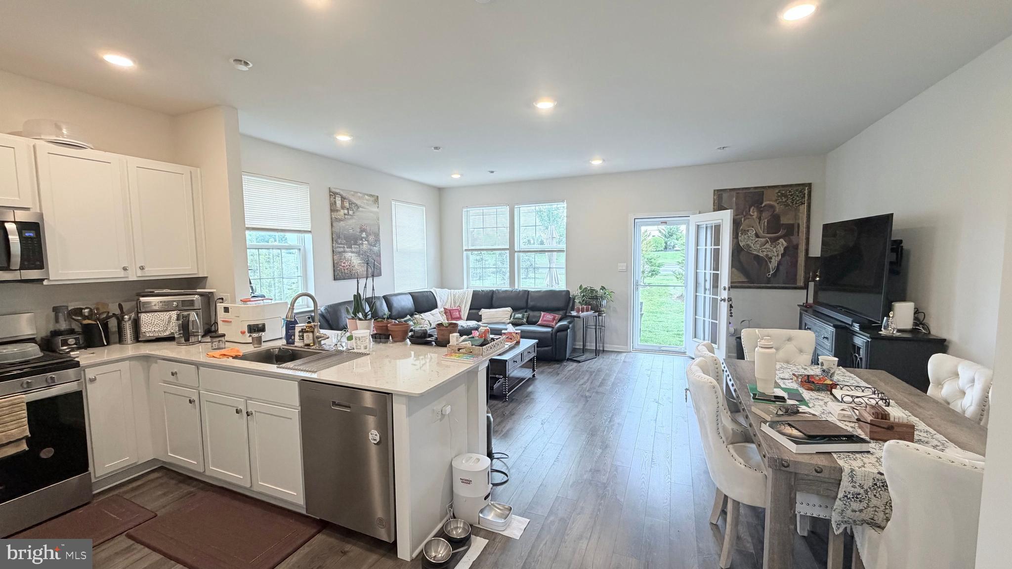 20 Nelsons Way Westampton, NJ 08060 - Photo 6 of 23 a open kitchen with sink cabinets and dining table