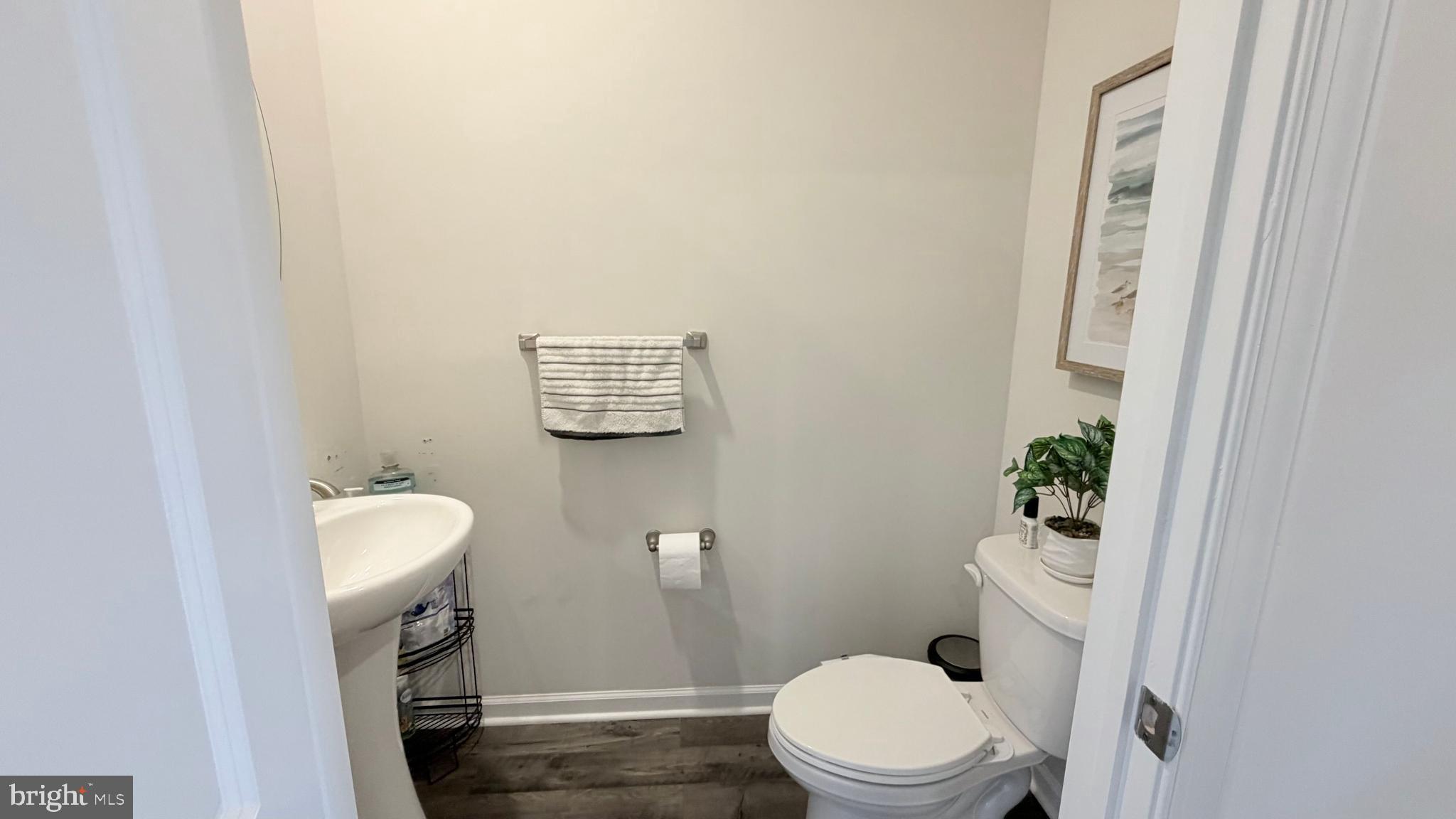 20 Nelsons Way Westampton, NJ 08060 - Photo 8 of 23 a white toilet sitting next to a bathroom sink