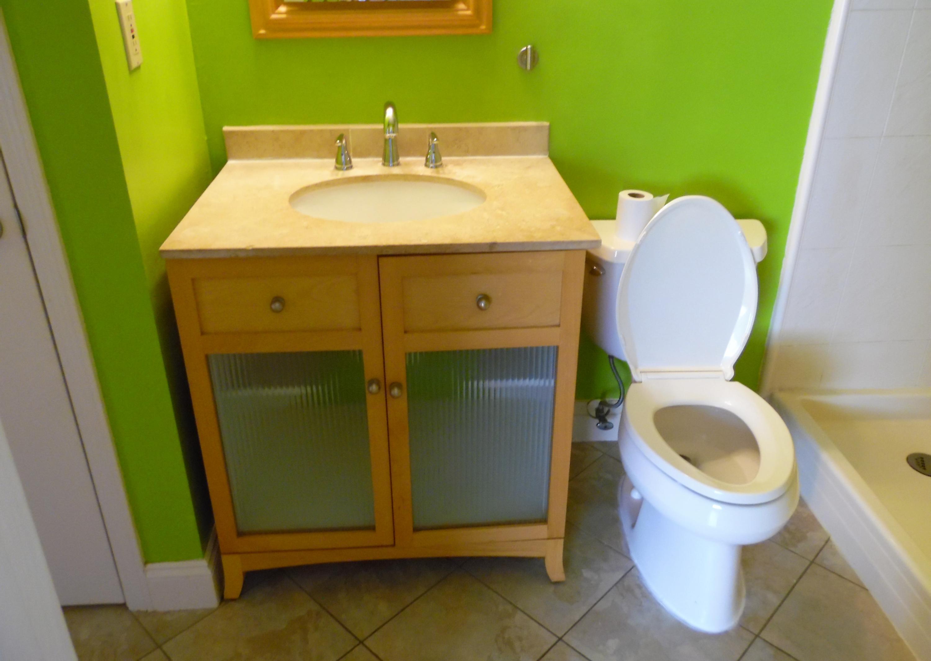 2580 Kingston Road Crestview, FL 32536 - Photo 12 of 20 a bathroom with a toilet and a sink