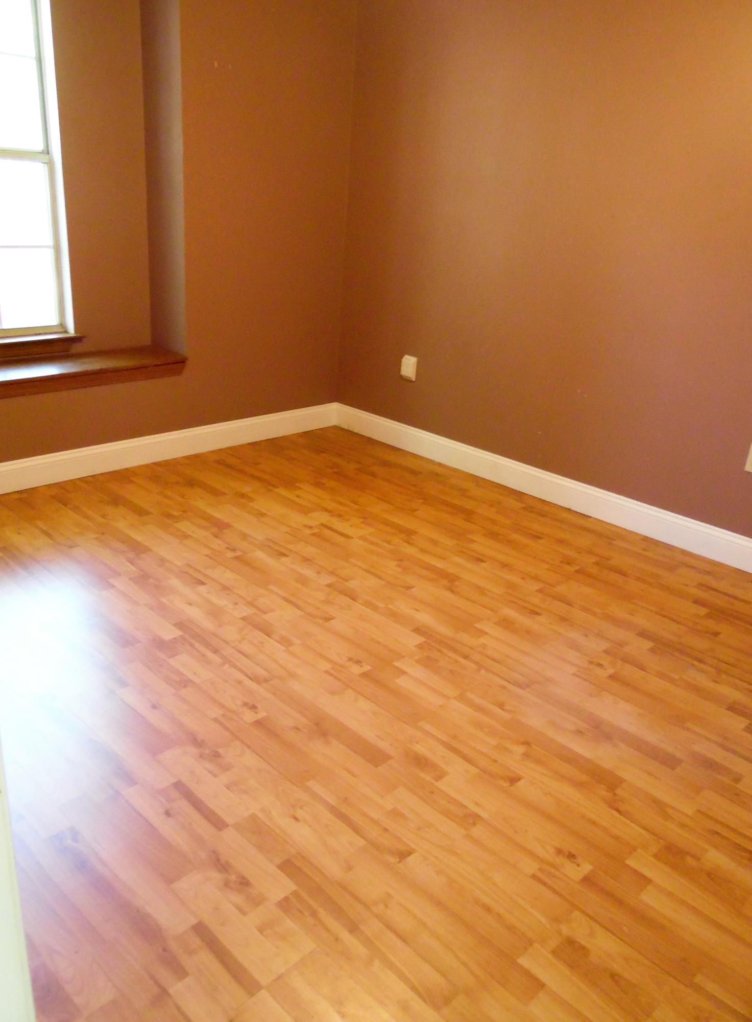 2580 Kingston Road Crestview, FL 32536 - Photo 15 of 20 a view of an empty room with wooden floor and a window