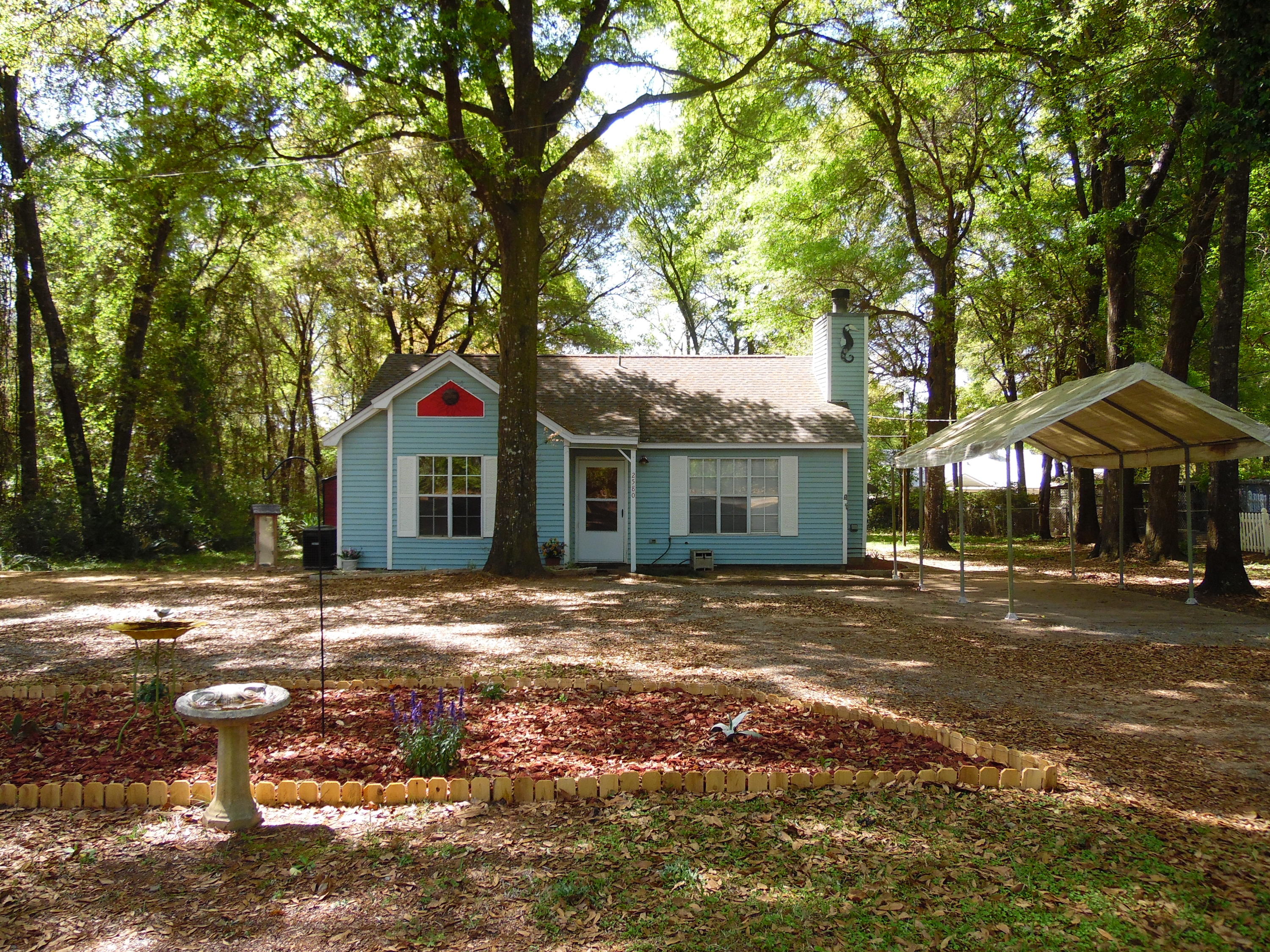2580 Kingston Road Crestview, FL 32536 - Photo 19 of 20 a view of a house with a yard