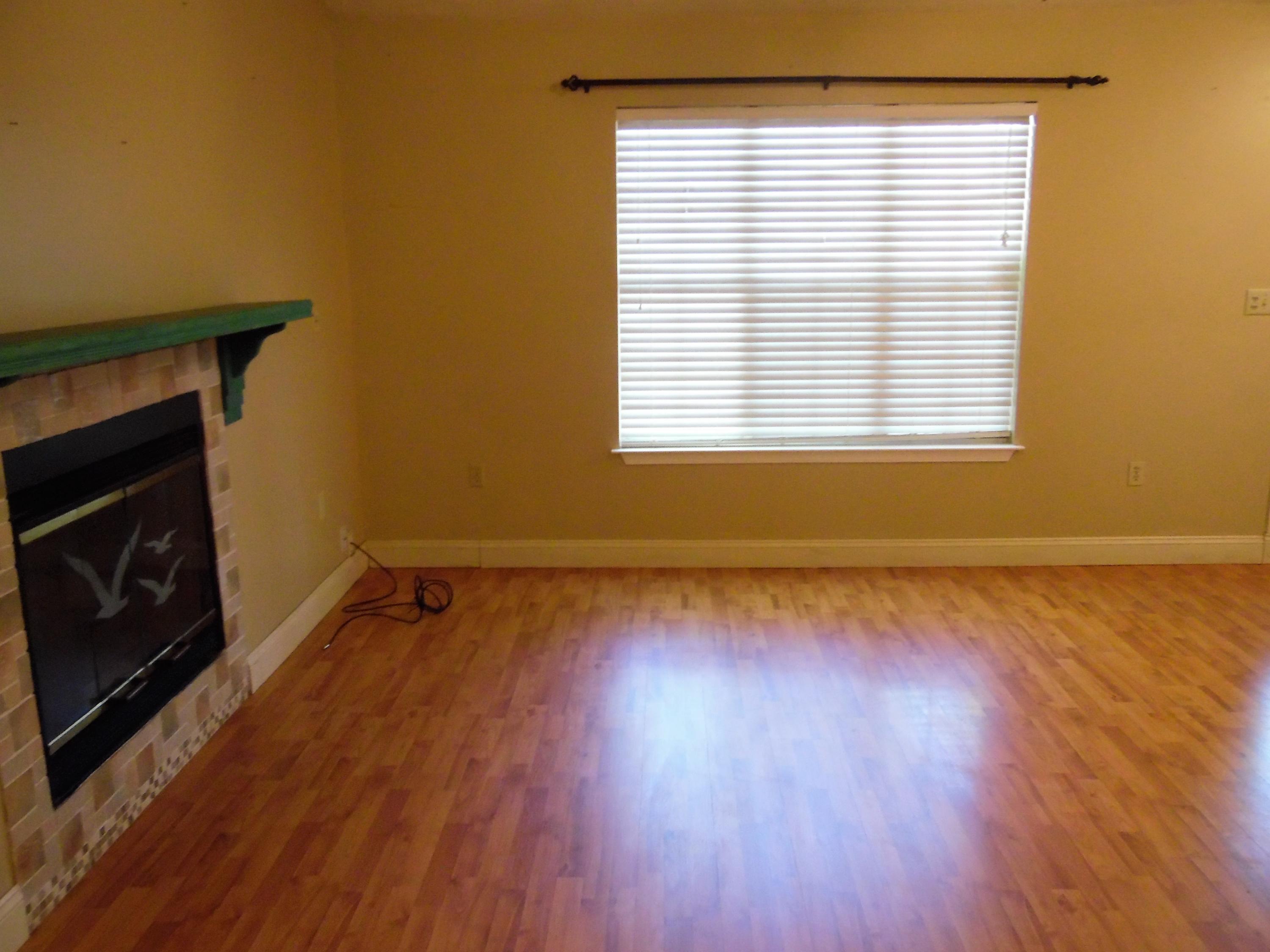 2580 Kingston Road Crestview, FL 32536 - Photo 4 of 20 a view of a room with wooden floor and a window