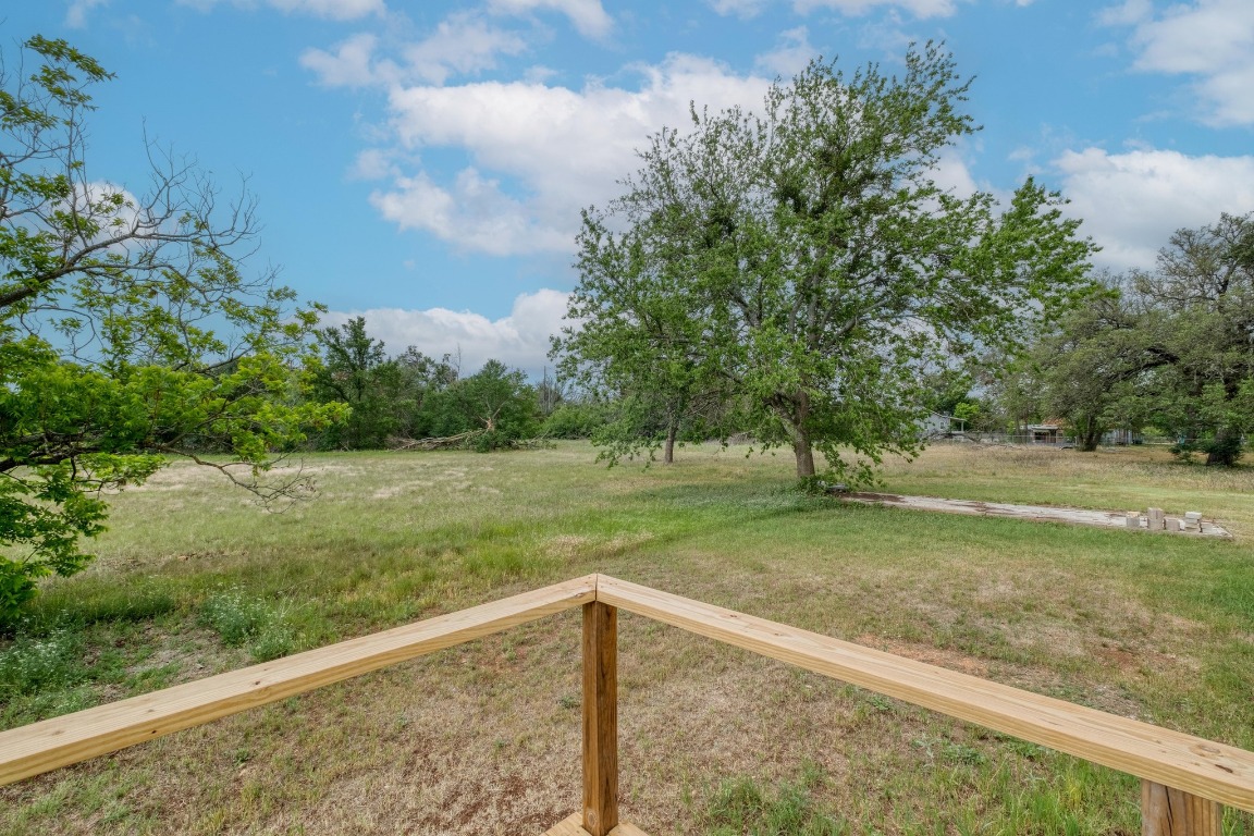 209 Fallwell Street Liberty Hill, TX 78642 - Photo 21 of 25 a view of a yard with large trees