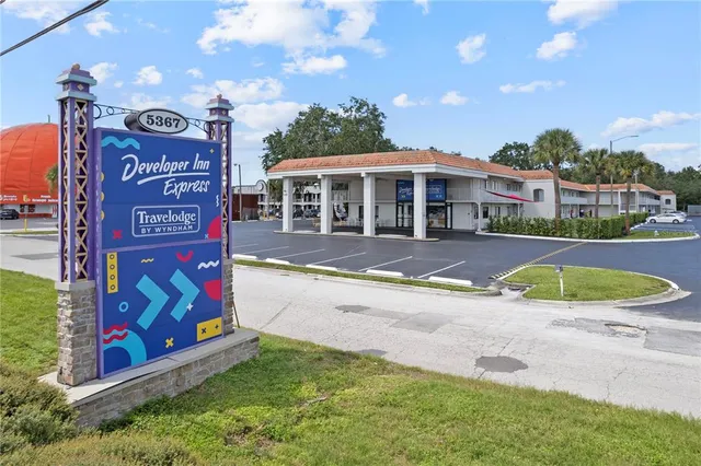 a view of a building with a swimming pool