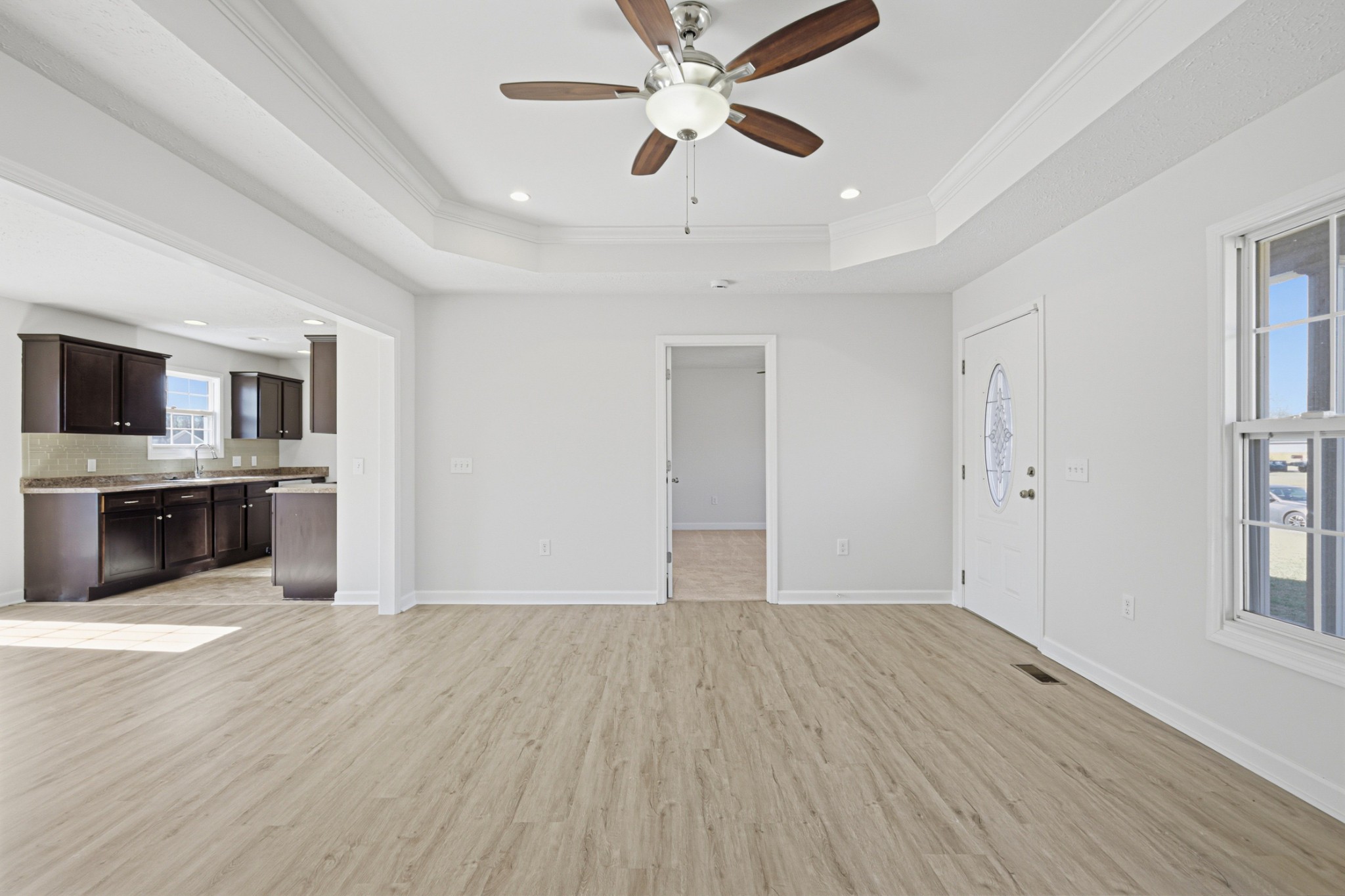 91 Creek Chase Road Manchester, TN 37355 - Photo 15 of 30 a view of a kitchen with a sink and dishwasher a kitchen island with wooden floor