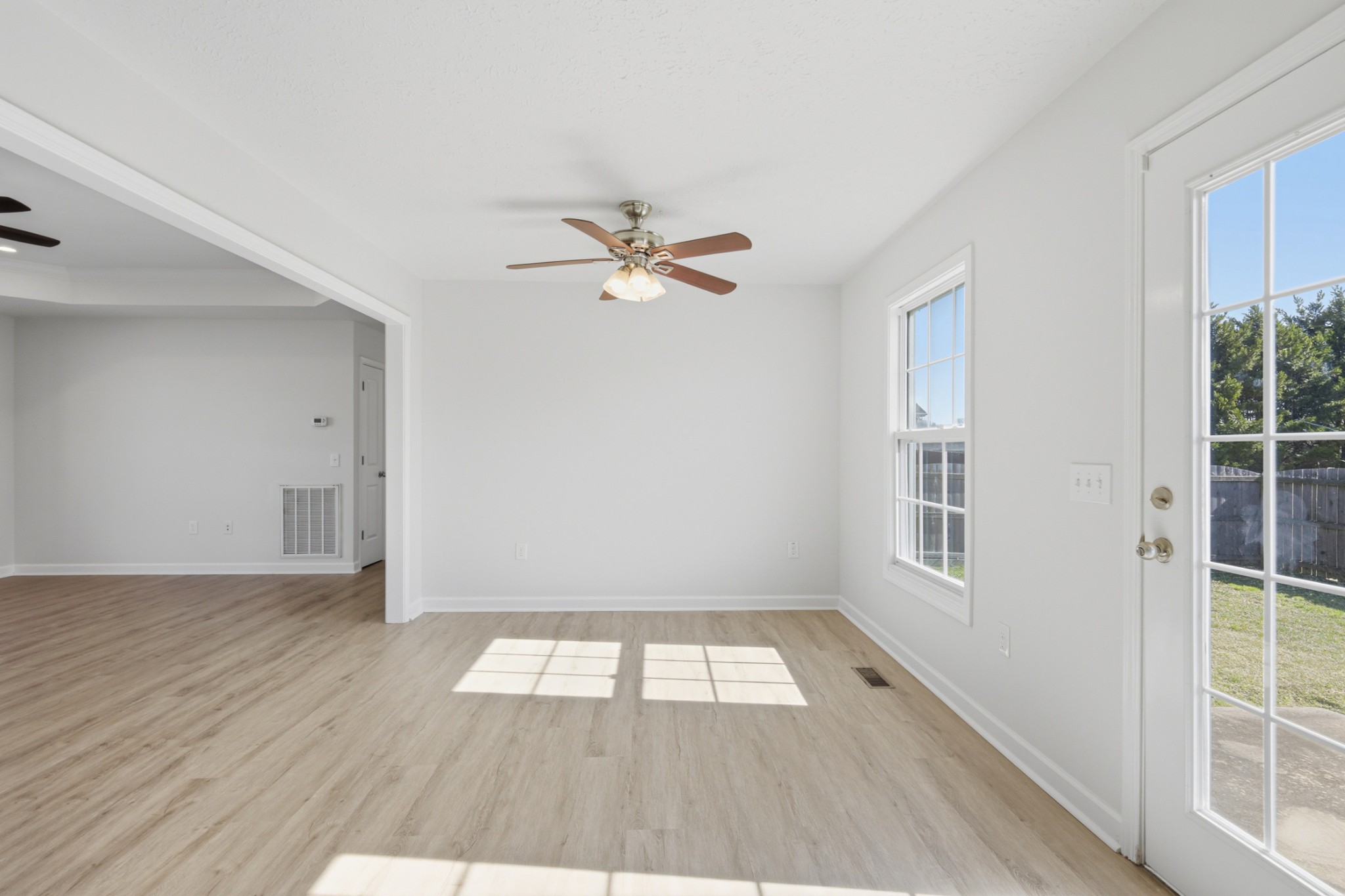 91 Creek Chase Road Manchester, TN 37355 - Photo 16 of 30 wooden floor in an empty room with a window
