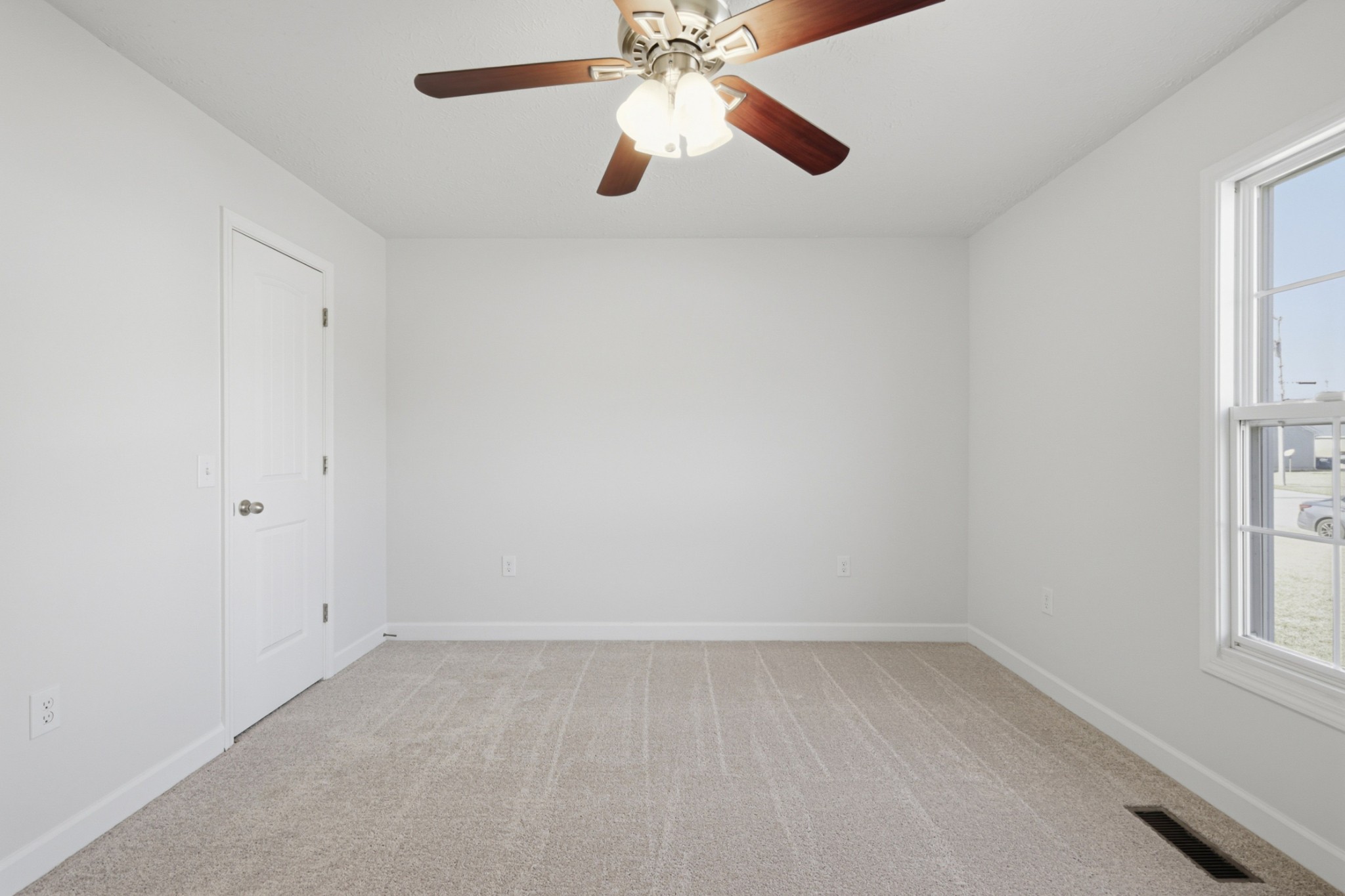 91 Creek Chase Road Manchester, TN 37355 - Photo 17 of 30 wooden floor in an empty room with a window
