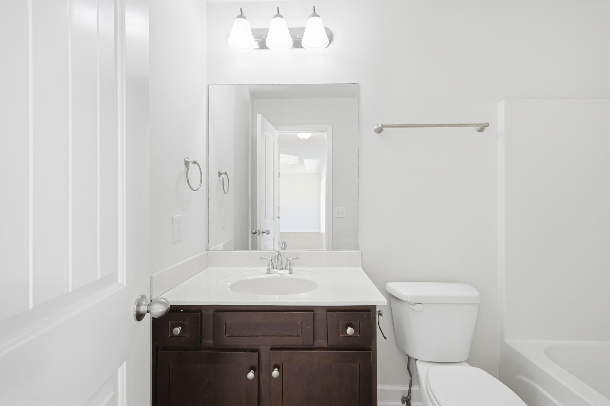 91 Creek Chase Road Manchester, TN 37355 - Photo 24 of 30 a bathroom with a sink toilet and vanity