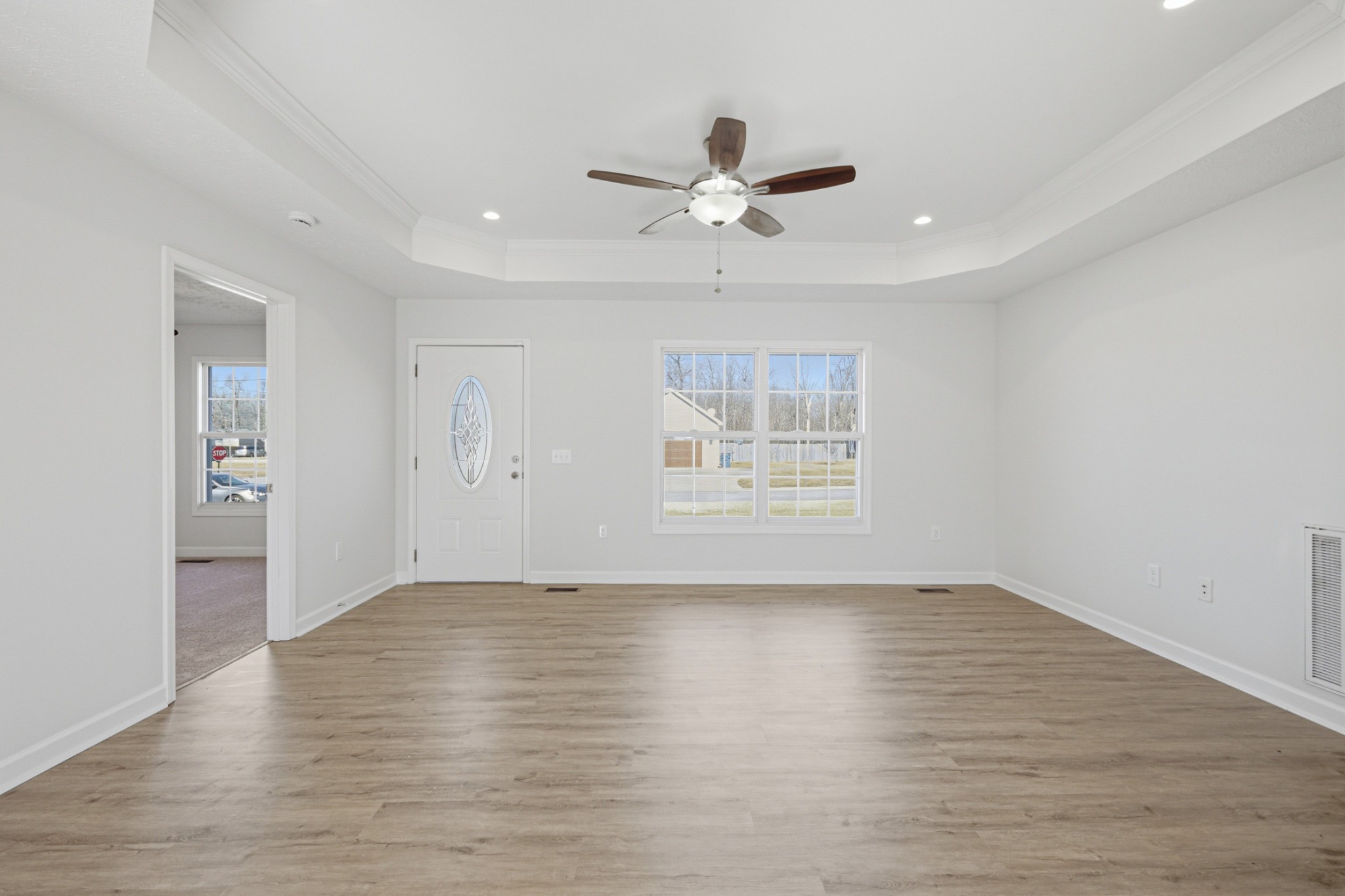 91 Creek Chase Road Manchester, TN 37355 - Photo 3 of 30 wooden floor in an empty room with a window