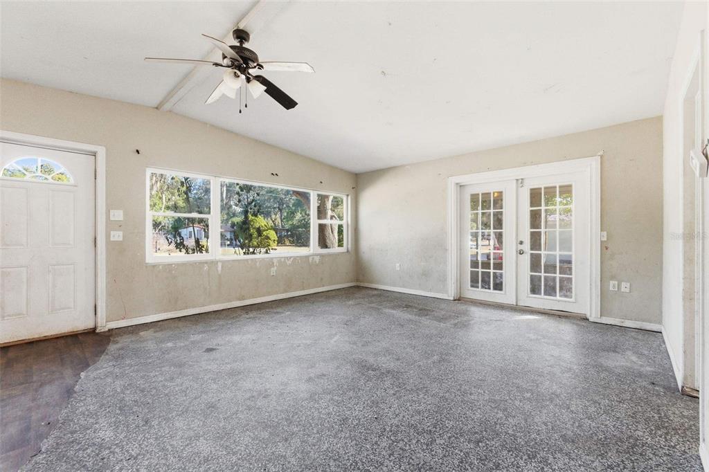 762 Valencia Avenue Orange City, FL 32763 - Photo 17 of 39 a view of an empty room with a window