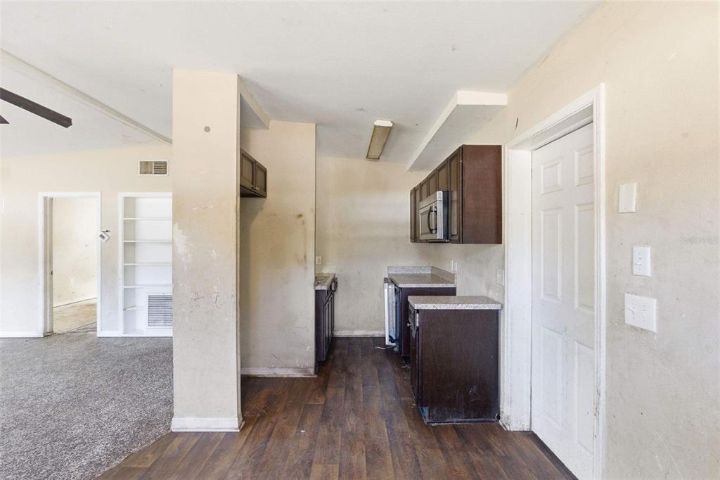 762 Valencia Avenue Orange City, FL 32763 - Photo 21 of 39 a view of a kitchen from the hallway