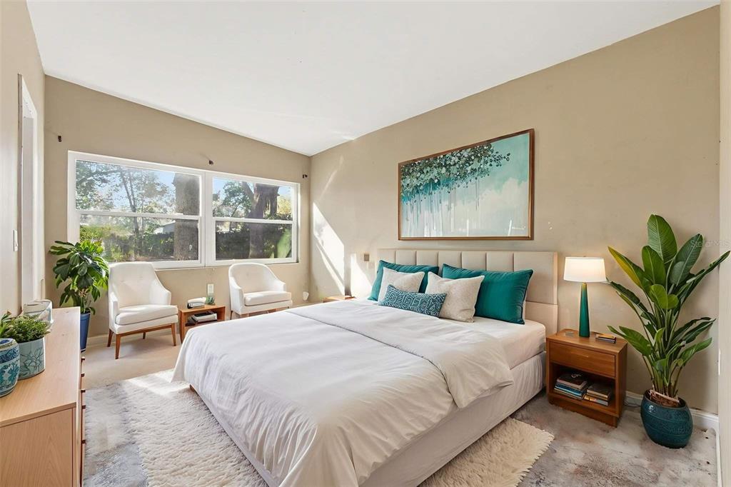 762 Valencia Avenue Orange City, FL 32763 - Photo 23 of 39 a bedroom with furniture and a large window