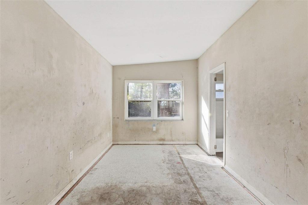 762 Valencia Avenue Orange City, FL 32763 - Photo 32 of 39 an empty room with windows