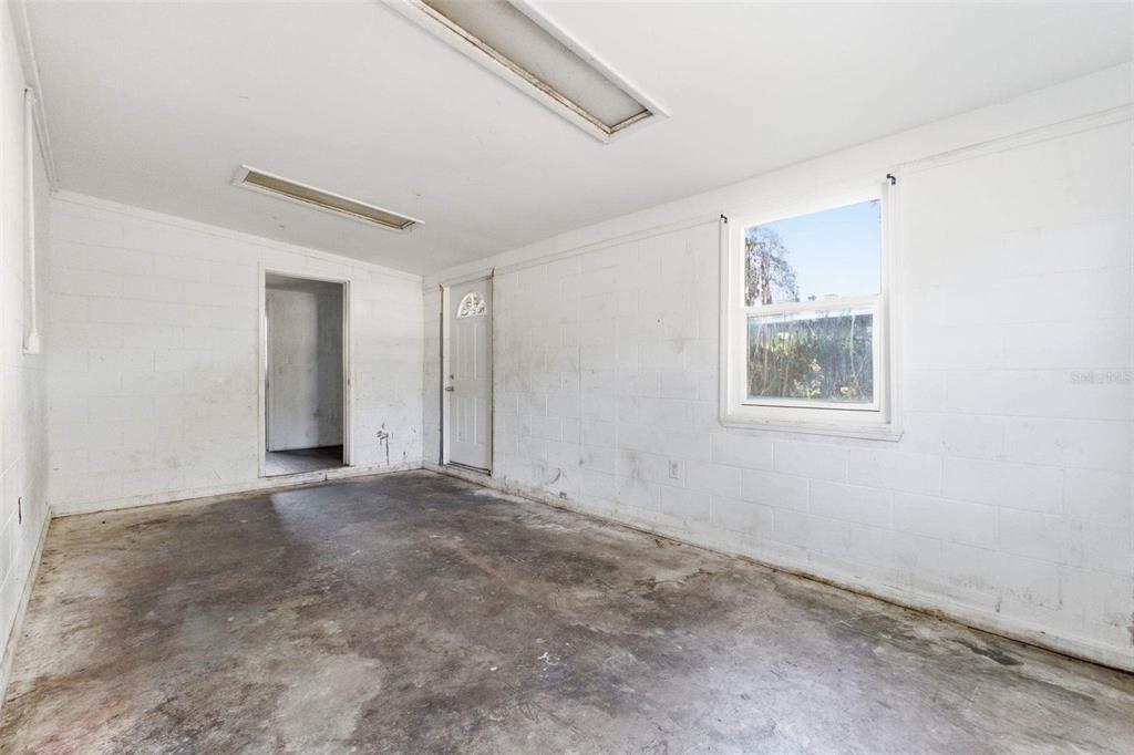 762 Valencia Avenue Orange City, FL 32763 - Photo 33 of 39 a view of an empty room with a window