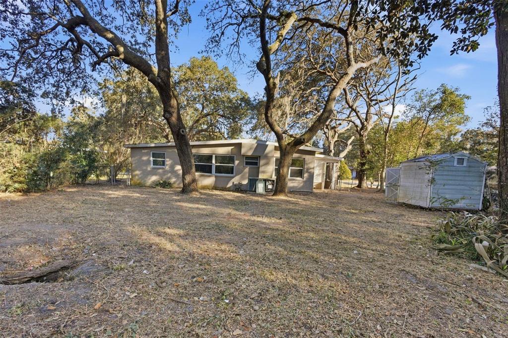 762 Valencia Avenue Orange City, FL 32763 - Photo 39 of 39 a view of a house with a yard and sitting area