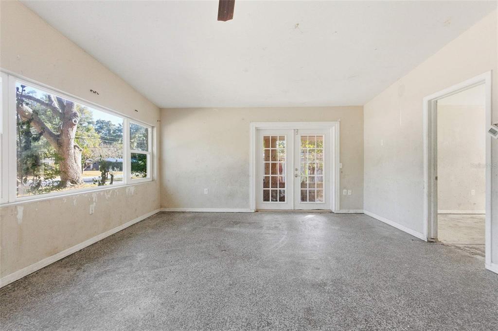 762 Valencia Avenue Orange City, FL 32763 - Photo 5 of 39 an empty room with windows