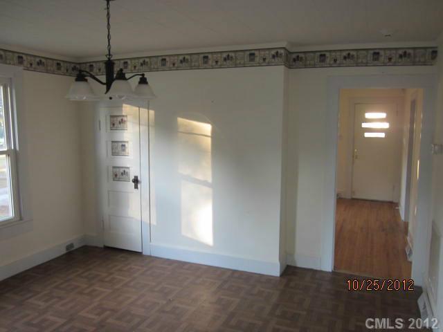1501 South Ridge Avenue Kannapolis, NC 28083 - Photo 4 of 9 a view of a room with an empty space and a window