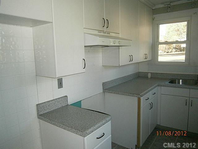 1501 South Ridge Avenue Kannapolis, NC 28083 - Photo 9 of 9 a kitchen with a sink cabinets and window