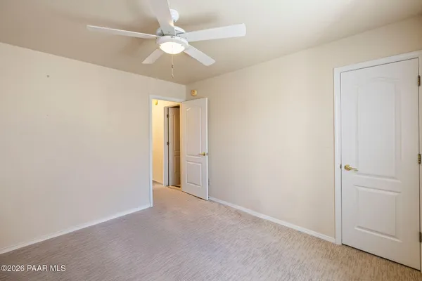 a room with furniture and gym equipment