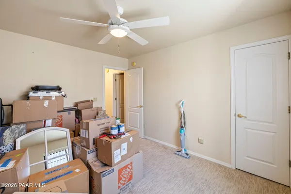 a bathroom with a sink toilet and mirror