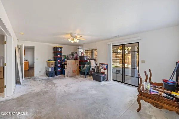 a view of a livingroom with a workspace