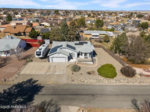 an aerial view of a swimming pool and mountain view