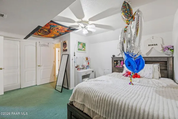 a view of a house with backyard porch