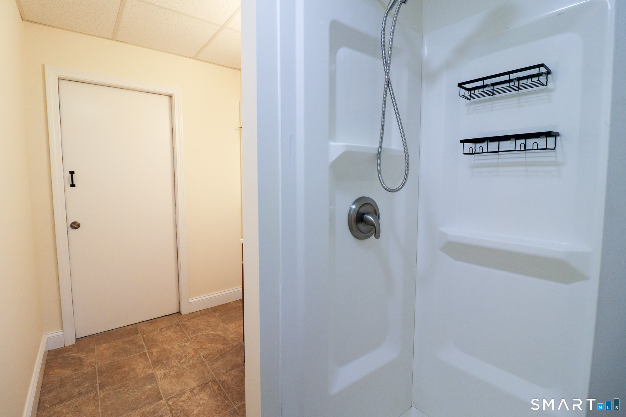 374 Main Street, Unit C Niantic, CT 06357 - Photo 17 of 31 a bathroom with a shower