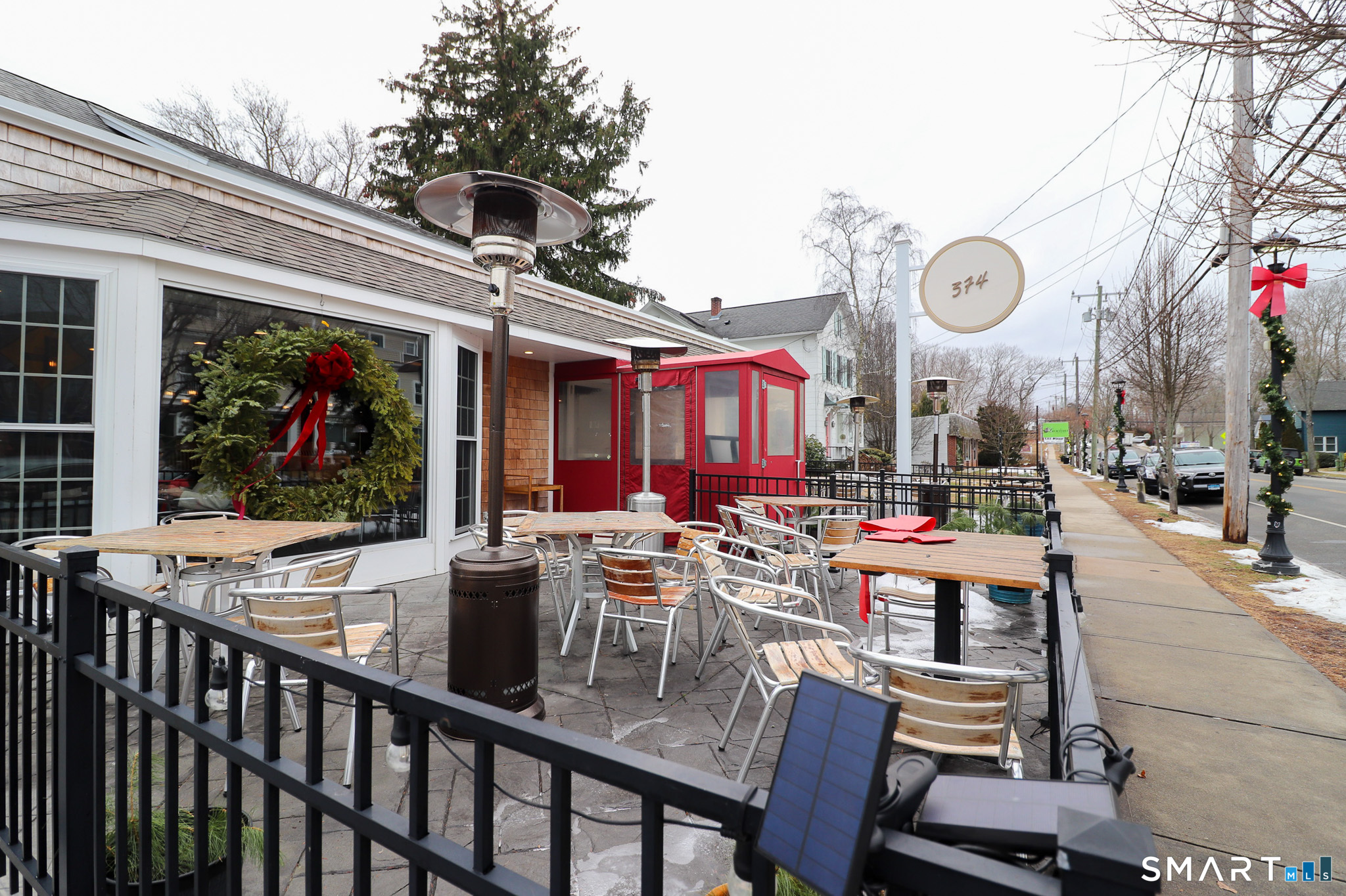 374 Main Street, Unit C Niantic, CT 06357 - Photo 26 of 31 a view of a patio with dining table and chairs