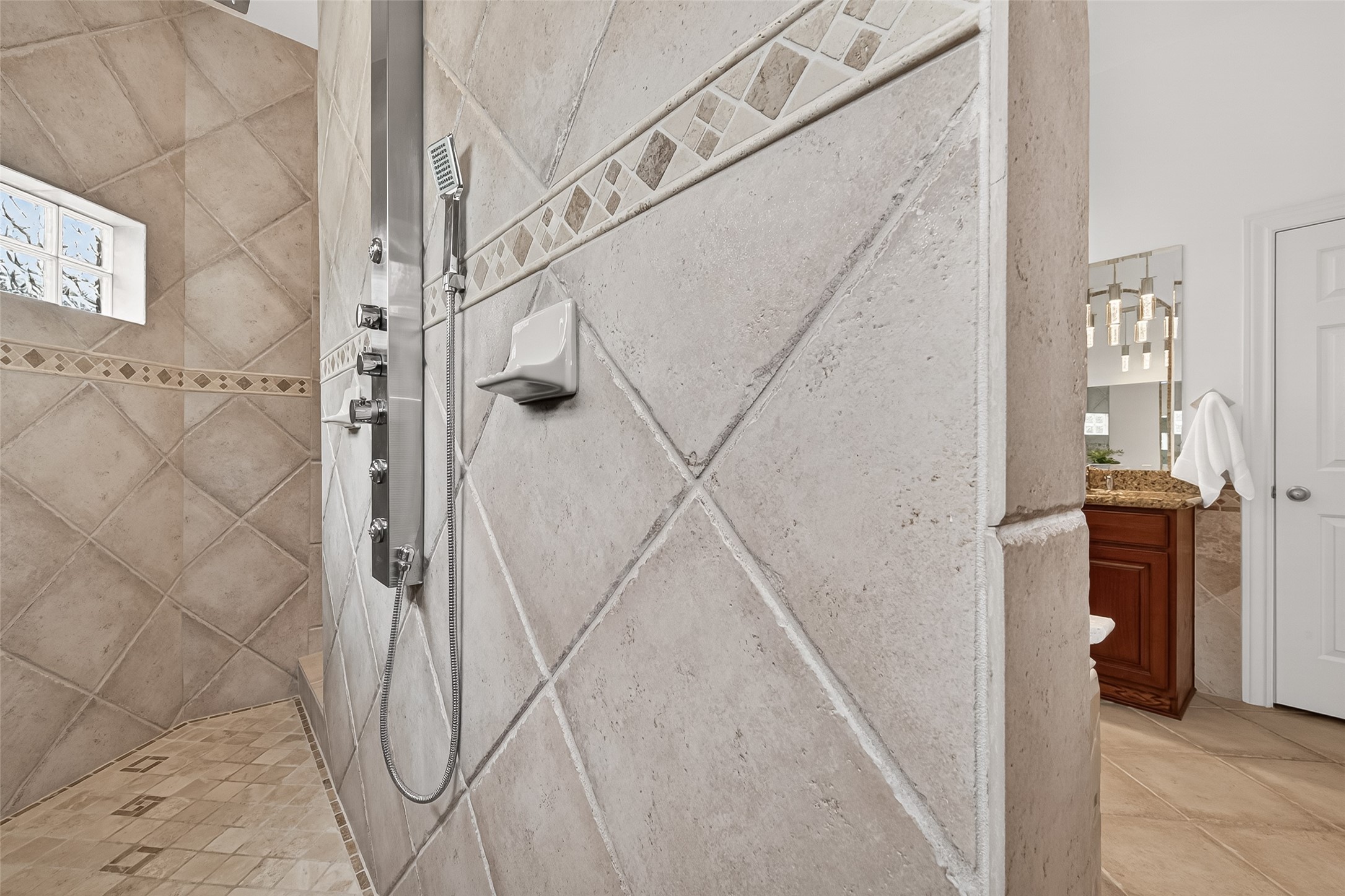 4203 Deforest Ridge Circle Katy, TX 77494 - Photo 25 of 50 ...and finish with a shower in the 'car wash' style walk-through shower that offers multiple spray features and generous space, creating a true retreat experience right at home