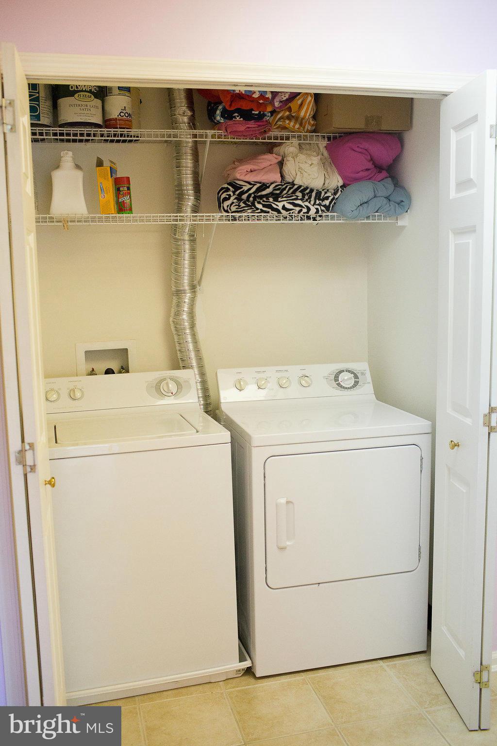 3018 Hunting Ridge Drive, Unit 3018 Owings Mills, MD 21117 - Photo 18 of 30 a utility room with dryer and washer
