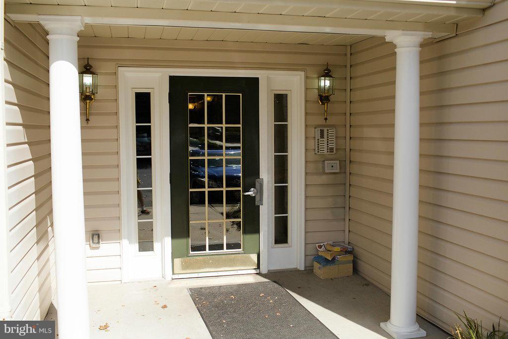 3018 Hunting Ridge Drive, Unit 3018 Owings Mills, MD 21117 - Photo 25 of 30 a view of a door and a window