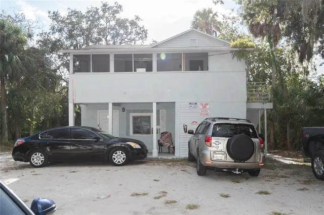 a view of a car in front of a house