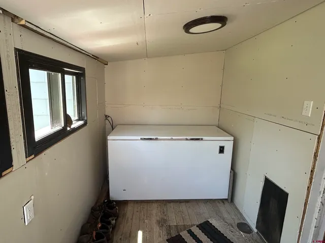 a room with storage and utility