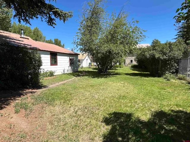 a view of a backyard with a garden