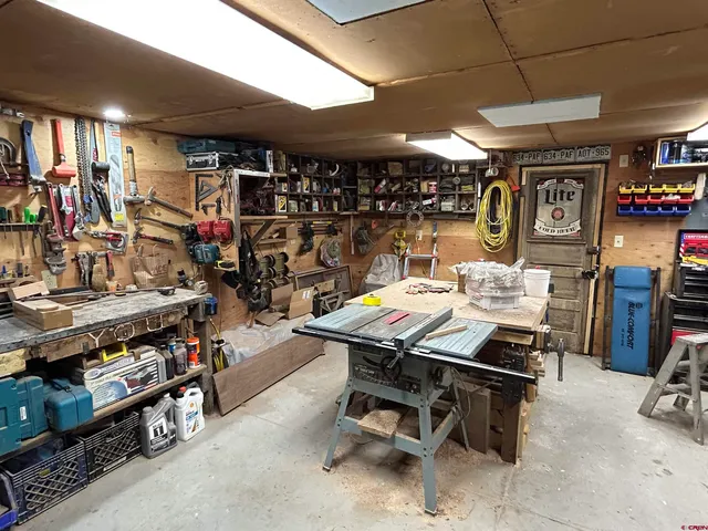 a view of a tables and chairs in a room