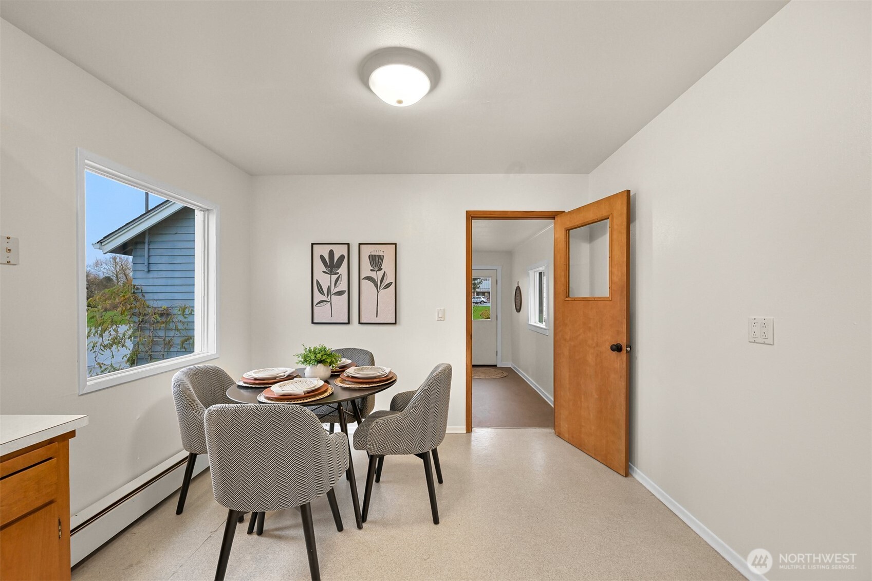 5811 Main Street Bow, WA 98232 - Photo 23 of 40 a dining room with furniture and window