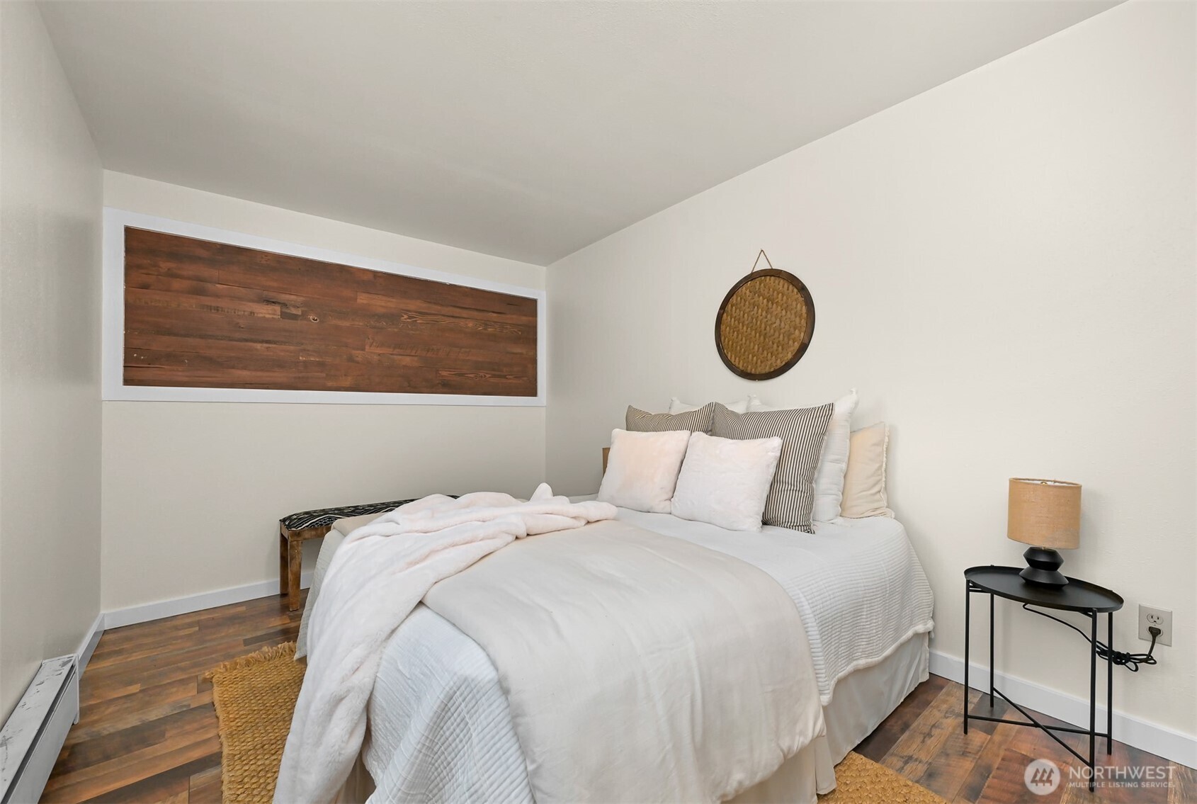 5811 Main Street Bow, WA 98232 - Photo 24 of 40 a bedroom with a bed and a chair