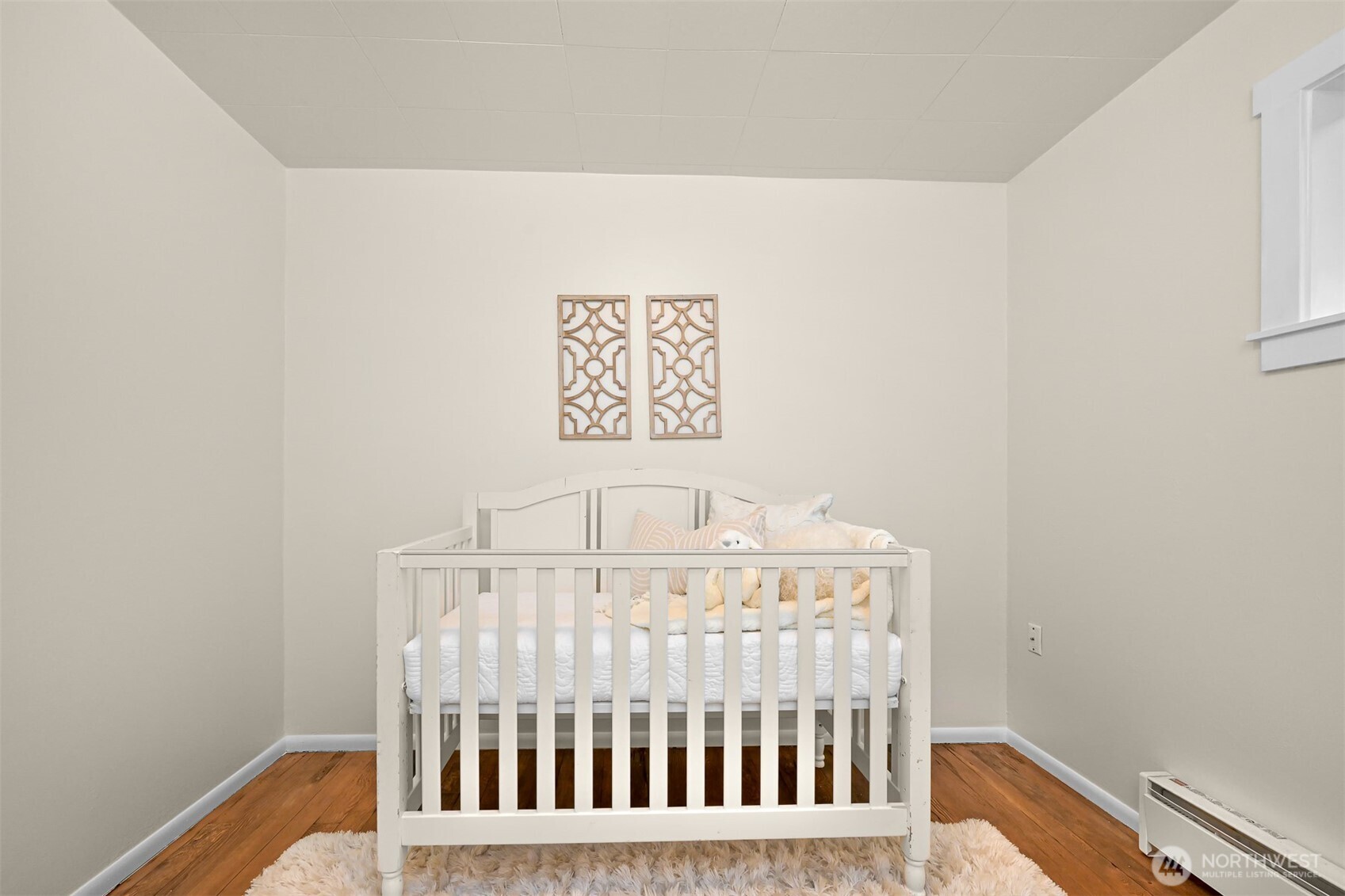5811 Main Street Bow, WA 98232 - Photo 34 of 40 a view of a bedroom with wooden floor