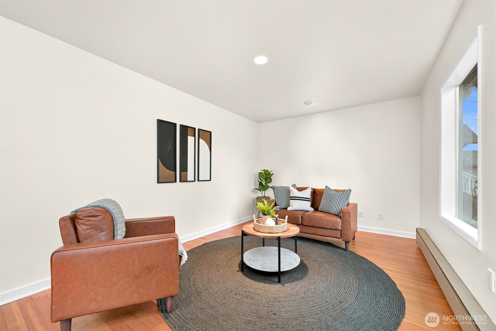 5811 Main Street Bow, WA 98232 - Photo 4 of 40 a living room with furniture and a potted plant