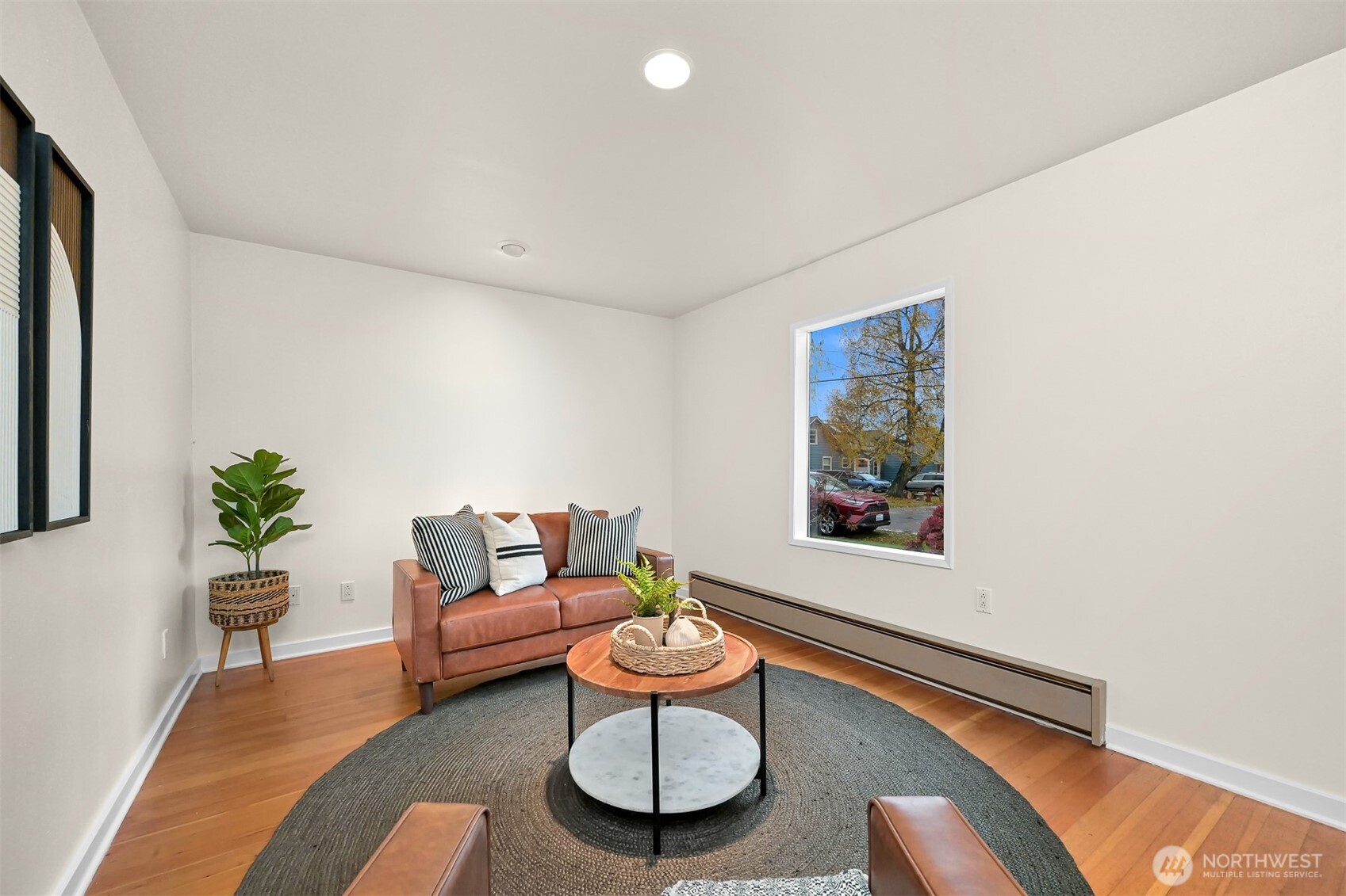 5811 Main Street Bow, WA 98232 - Photo 6 of 40 a living room with furniture and a potted plant