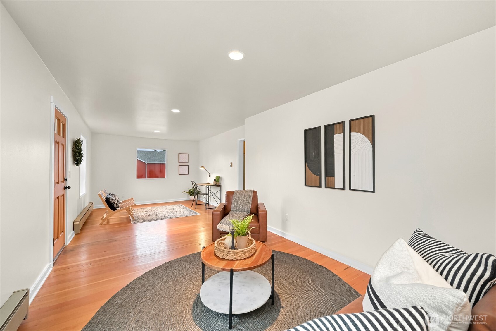 5811 Main Street Bow, WA 98232 - Photo 7 of 40 a living room with furniture and wooden floor