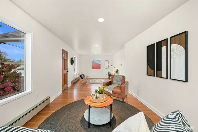 a living room with furniture and a window