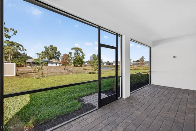 a view of a porch and garden