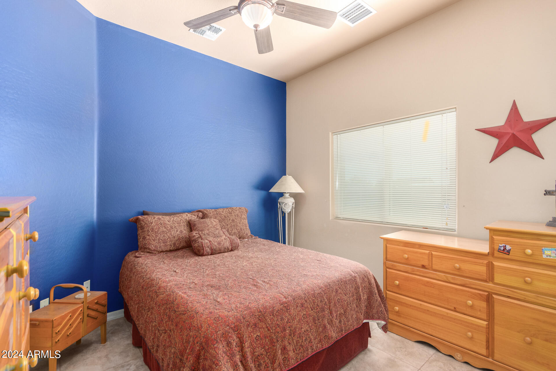 6786 Gelding Lane Coolidge, AZ 85128 - Photo 34 of 39 a bedroom with a bed and a window